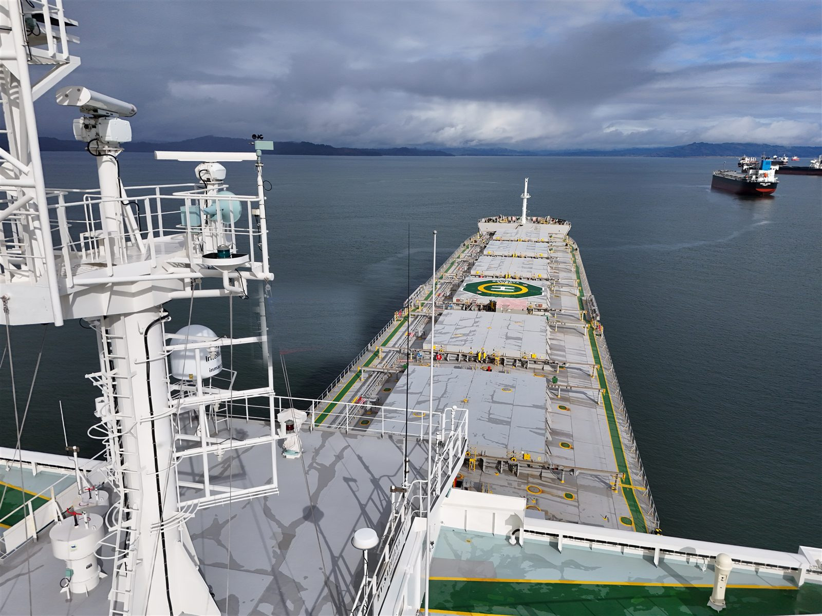 The deck of a bulk carrier looking toward the open sea